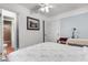 Bedroom with updated ensuite bathroom, desk area, and neutral paint at 23327 Christian Cir, Brooksville, FL 34601