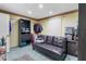 Versatile flex room with ample storage, a comfortable sofa, and neutral decor at 23327 Christian Cir, Brooksville, FL 34601