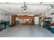 Functional garage space with storage cabinets and room for projects and organization at 23327 Christian Cir, Brooksville, FL 34601