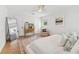 Bedroom with a queen bed, vintage decor, and lots of light at 2512 W Jetton Ave, Tampa, FL 33629