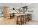 Open-concept kitchen boasts a large island with seating and modern appliances at 2512 W Jetton Ave, Tampa, FL 33629