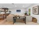 The inviting living room boasts stylish decor, an open layout, and a kitchen bar with comfortable seating at 2512 W Jetton Ave, Tampa, FL 33629
