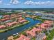 Aerial view showcasing the waterfront community and its picturesque surroundings at 2733 Via Cipriani # 830B, Clearwater, FL 33764