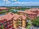 Aerial view showcasing the coastal community at 2733 Via Cipriani # 830B, Clearwater, FL 33764