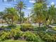 Enjoy the landscaped roundabout with a decorative fountain at 2733 Via Cipriani # 830B, Clearwater, FL 33764
