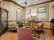 Cozy sitting room with unique decor, comfortable seating, and marble floors at 2733 Via Cipriani # 830B, Clearwater, FL 33764