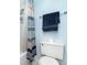 Clean bathroom featuring a shower with curtain, towel bar, and toilet with nearby tissue at 2901 26Th W St # 815, Bradenton, FL 34205