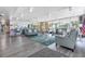 Inviting lobby area with plush seating, modern decor, and an abundance of natural light at 2901 26Th W St # 815, Bradenton, FL 34205