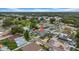 Wide aerial shot showcasing a gray two-story home situated within a well-established neighborhood at 3013 W Crest Ave, Tampa, FL 33614