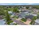 Neighborhood aerial view showcasing the home with its well-manicured lawn in a residential community at 3013 W Crest Ave, Tampa, FL 33614