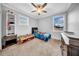 Cozy bedroom with natural light, ceiling fan, and neutral tones, perfect for a room at 3013 W Crest Ave, Tampa, FL 33614