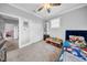 Bright bedroom featuring ample space and neutral tones, making it versatile for various uses at 3013 W Crest Ave, Tampa, FL 33614