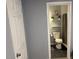 View into a bathroom with a decorative sink and shelves at 305 E Adalee St, Tampa, FL 33603