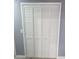 Bright, white louvered closet door at 305 E Adalee St, Tampa, FL 33603