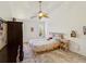 Cozy bedroom with bright natural light and a decorative ceiling fan at 3077 Branch Dr, Clearwater, FL 33760