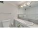 Clean bathroom featuring a sleek vanity, a well-lit mirror, and a shower/tub combination, ensuring functionality at 31 Island Way # 502, Clearwater Beach, FL 33767