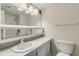 Bathroom features a vanity with sink, a large mirror, and a shower-tub combination at 31 Island Way # 502, Clearwater Beach, FL 33767