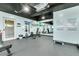 Well-appointed fitness area with exercise ball storage, weight bench, and mirrors, perfect for a comprehensive workout routine at 31 Island Way # 502, Clearwater Beach, FL 33767