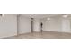 Minimalist living room with new light wood floors and modern fixtures; updated for comfort at 31 Island Way # 502, Clearwater Beach, FL 33767