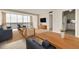 Spacious living room with dining area, large windows, and stylish furnishings at 31 Island Way # 502, Clearwater Beach, FL 33767