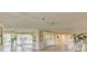 Welcoming lobby with large windows, abundant seating, and a reception area at 31 Island Way # 502, Clearwater Beach, FL 33767
