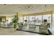 Inviting lobby with wicker seating and large windows offering picturesque waterfront views, creating a serene and welcoming atmosphere at 31 Island Way # 502, Clearwater Beach, FL 33767