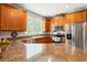 Well-equipped kitchen with granite countertops, stainless steel appliances, and ample cabinet space at 3519 Heards Ferry Dr, Tampa, FL 33618