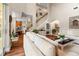 Open-concept living area with a staircase, hardwood flooring, and elegant design elements at 3519 Heards Ferry Dr, Tampa, FL 33618