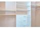 Walk-in closet with adjustable shelving and drawers at 37526 New Horizons Blvd, Zephyrhills, FL 33541