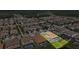 This aerial view showcases the property in a community with easy access to trees, water, and other amenities at 3999 Burdick Loop, Odessa, FL 33556