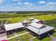 Aerial view of the outdoor venue, featuring multiple buildings, expansive lawns, and seating areas at 3999 Burdick Loop, Odessa, FL 33556