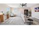 Comfortable living room with modern furniture, neutral colors, and natural light at 3999 Burdick Loop, Odessa, FL 33556