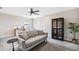 Comfortable living room with plush gray sofa and contemporary furnishings for relaxing at 3999 Burdick Loop, Odessa, FL 33556