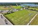 Aerial view of the recreation field, parking lot, and baseball fields within the community at 3999 Burdick Loop, Odessa, FL 33556