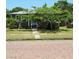 Cozy single-story home with well-maintained lawn and inviting entrance at 4350 2Nd S Ave, St Petersburg, FL 33711