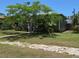 Charming home with lush landscaping and stone walkway, perfect for curb appeal at 4350 2Nd S Ave, St Petersburg, FL 33711
