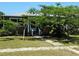 Charming home with lush landscaping and stone walkway, perfect for curb appeal at 4350 2Nd S Ave, St Petersburg, FL 33711