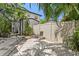 Private backyard area with patio, chair, and tasteful landscaping at 441 75Th N Ave, St Petersburg, FL 33702