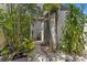 Exterior side entrance with lush greenery at 441 75Th N Ave, St Petersburg, FL 33702