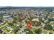 Aerial view of the property location within a residential neighborhood surrounded by mature trees at 4461 Shore Acres Ne Blvd, St Petersburg, FL 33703