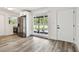 The kitchen features laminate floors, stainless steel appliances, and is bright and inviting at 4461 Shore Acres Ne Blvd, St Petersburg, FL 33703
