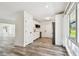 Bright kitchen features laminate floors, and stainless steel appliances and is open to the living spaces at 4461 Shore Acres Ne Blvd, St Petersburg, FL 33703