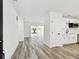 Bright and airy open concept featuring laminate floors, recessed lighting and neutral color palette throughout at 4461 Shore Acres Ne Blvd, St Petersburg, FL 33703