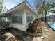 Image capturing the side of the home and surrounding landscaping, displaying exterior features at 4641 Carson Ne St, St Petersburg, FL 33703