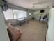 Spacious living room with large windows, allowing ample natural light, ready for personalization at 4641 Carson Ne St, St Petersburg, FL 33703