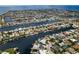 Expansive waterfront community with canals, docks, and beautiful homes under a sunny sky at 5008 Glenn Dr, New Port Richey, FL 34652