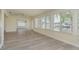 Spacious living room with tile flooring and views of the water at 5008 Glenn Dr, New Port Richey, FL 34652