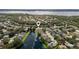 Aerial community view showcasing water view and established homes at 5360 Karlsburg Pl, Palm Harbor, FL 34685