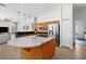 Modern kitchen features a large center island and stainless steel appliances at 5360 Karlsburg Pl, Palm Harbor, FL 34685