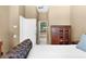 Spacious main bedroom with view to the ensuite bathroom at 5360 Karlsburg Pl, Palm Harbor, FL 34685